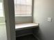 Dedicated office space with window and built-in desk area at 5701 Bentgrass Dr # 18-203, Sarasota, FL 34235