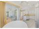 Breakfast nook with views to screened in lanai, kitchen, and living areas at 5872 Mckinley Rd, Venice, FL 34293