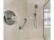 Bathroom shower offers modern fixtures and a grab bar for increased safety at 5872 Mckinley Rd, Venice, FL 34293