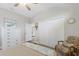 This bedroom features a ceiling fan, wood-look floors, and a large closet at 6 Bunker Cir, Rotonda West, FL 33947