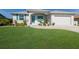 Charming single-Gathering home with a well-manicured lawn and inviting curb appeal at 6 Bunker Cir, Rotonda West, FL 33947