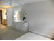 Bedroom with an off white dresser featuring a mirror at 6042 Red Maple Rd # 1001, Bradenton, FL 34210