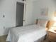 Cozy bedroom with a twin bed and matching nightstand at 6042 Red Maple Rd # 1001, Bradenton, FL 34210