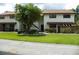 Well-maintained condo with manicured lawn and mature landscaping, offering great curb appeal at 6042 Red Maple Rd # 1001, Bradenton, FL 34210