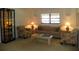 Cozy living room with floral armchairs, sofa, and decorative lighting for comfortable living at 6042 Red Maple Rd # 1001, Bradenton, FL 34210