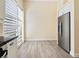 Kitchen area with stainless steel refrigerator and breakfast nook with plantation shutters at 6316 Walton Heath Pl, University Park, FL 34201