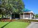 Tennis & Fitness Center exterior with lush landscaping, offering premier recreational facilities at 6316 Walton Heath Pl, University Park, FL 34201