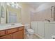 Bathroom with walk-in tub, single vanity and tile flooring at 6857 Wild Lake Ter, Bradenton, FL 34212