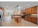 Well-lit kitchen featuring stainless appliances, granite countertops, and a center island at 6857 Wild Lake Ter, Bradenton, FL 34212