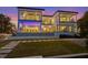 Modern two-story home with sleek lines and a stunning outdoor entertainment area, including a pool at 7003 Holmes Blvd, Holmes Beach, FL 34217