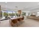 Spacious kitchen with an island, bar seating, and a seamless transition to the living area at 7003 Holmes Blvd, Holmes Beach, FL 34217