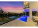 Beautiful modern waterfront home with a stunning pool and gorgeous views at 7003 Holmes Blvd, Holmes Beach, FL 34217