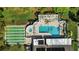 Aerial view of community pool, hot tub, shuffleboard court, and sundeck at 7407 29Th Avenue W Dr # 2288, Bradenton, FL 34209
