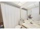 Bathroom featuring a standard toilet, a single sink vanity and a bathtub with shower at 7407 29Th Avenue W Dr # 2288, Bradenton, FL 34209