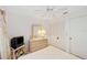 Cozy bedroom with light wood furnishings, including dresser and closet at 7407 29Th Avenue W Dr # 2288, Bradenton, FL 34209