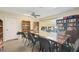 Common room features a large table with chairs and built-in bookcases at 7407 29Th Avenue W Dr # 2288, Bradenton, FL 34209