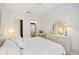 Bright bedroom featuring neutral colors, a closet, and an ensuite bathroom at 7407 29Th Avenue W Dr # 2288, Bradenton, FL 34209