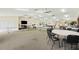 Bright recreation room with tables, chairs, pool tables, and gym equipment; great for community gatherings at 7407 29Th Avenue W Dr # 2288, Bradenton, FL 34209