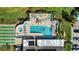 Aerial view of the community swimming pool and lounge area; a perfect spot to relax and soak up the sun at 7407 29Th Avenue W Dr # 2288, Bradenton, FL 34209
