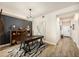 Home office with a stylish desk, modern decor, and plenty of natural light at 7911 Grand Estuary Trl # 102, Bradenton, FL 34212