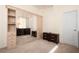 Spacious bedroom with a mirror-doored closet and two wooden dressers, offering plenty of storage at 803 Coral Bean Cv, Venice, FL 34293