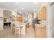 Bright open kitchen with an island and stainless steel appliances at 803 Coral Bean Cv, Venice, FL 34293