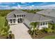 Beautiful aerial view of a two-story home with manicured landscaping at 8364 Sea Glass Ct, Sarasota, FL 34240