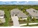 Beautiful aerial view of property showcasing a spacious lot and lush landscaping at 8364 Sea Glass Ct, Sarasota, FL 34240