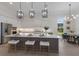 Beautiful kitchen featuring a center island, stainless steel appliances, pendant lighting, and breakfast nook at 8364 Sea Glass Ct, Sarasota, FL 34240