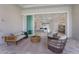 Inviting outdoor living space with comfortable seating and an open view to the indoor living areas at 8364 Sea Glass Ct, Sarasota, FL 34240