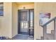 Inviting front door with a decorative wreath, offering a warm welcome to a cozy and secure home at 8710 Midnight Pass Rd # 501B, Sarasota, FL 34242