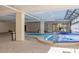 Enclosed hot tub area featuring an indoor lounge and pool, providing a relaxing and enjoyable experience at 8710 Midnight Pass Rd # 501B, Sarasota, FL 34242