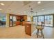 Well-equipped kitchen with stainless steel appliances, granite countertops, and an island with bar seating at 8710 Midnight Pass Rd # 501B, Sarasota, FL 34242