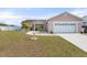 Charming single Gathering home featuring a two-car garage, well maintained lawn and mature landscaping at 9408 69Th E Ave, Palmetto, FL 34221