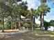 Picturesque community gazebo surrounded by mature trees and lush landscaping at 9460 Discovery Ter # 202D, Bradenton, FL 34212