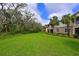 Lush green space behind the homes in this vibrant community offers a serene setting at 9460 Discovery Ter # 202D, Bradenton, FL 34212