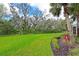 Lush green space with mature trees surrounding the homes in this vibrant community at 9460 Discovery Ter # 202D, Bradenton, FL 34212