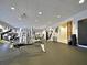 Well-equipped community gym features modern exercise equipment, ample space, and a clean, inviting atmosphere at 9460 Discovery Ter # 202D, Bradenton, FL 34212
