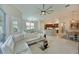 Open floor plan view from living room into the kitchen and dining areas at 9460 Discovery Ter # 202D, Bradenton, FL 34212