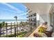 Lovely balcony with seating offers stunning views of the beach and ocean at 101 Benjamin Franklin Dr # 63, Sarasota, FL 34236