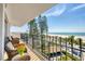 Relax on this breezy balcony and enjoy direct views of the beach and Gulf at 101 Benjamin Franklin Dr # 63, Sarasota, FL 34236