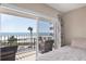 Balcony featuring chairs, a railing, and panoramic ocean views enhancing the condo's serene beachside appeal at 101 Benjamin Franklin Dr # 63, Sarasota, FL 34236