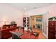 Bright office area has a view to another room at 10802 Seasons Way, Palmetto, FL 34221