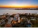 Aerial view of luxury coastal homes near the ocean, perfect for serene waterfront living at 116 Garden Ln, Sarasota, FL 34242
