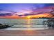 Picturesque beach scene featuring a calm ocean and a beautiful sky at sunset at 116 Garden Ln, Sarasota, FL 34242
