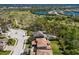 Aerial view of a neighborhood, highlighting lush green spaces, walking paths, and community lakes surrounding the homes at 12022 Medley Ter, Lakewood Ranch, FL 34211