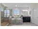 Luxurious bathroom boasting a soaking tub, glass-enclosed shower, and elegant vanity at 12022 Medley Ter, Lakewood Ranch, FL 34211
