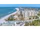 Breathtaking aerial view of a luxurious building near the beach, featuring coastal views and an oceanfront pool at 1300 Benjamin Franklin Dr # 304, Sarasota, FL 34236