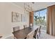 Comfortable dining area with modern light fixture and expansive outdoor views at 1300 Benjamin Franklin Dr # 304, Sarasota, FL 34236