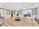 A grand lobby showcasing a chandelier, elegant wainscoting, and beautiful tile flooring at 1300 Benjamin Franklin Dr # 304, Sarasota, FL 34236